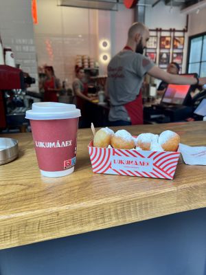 Doppio espresso and lukumades with powdered sugar.  at Lukumades in Athens