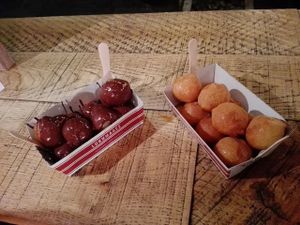 lukumades with dark chocolate and agave syrup at Lukumades in Athens