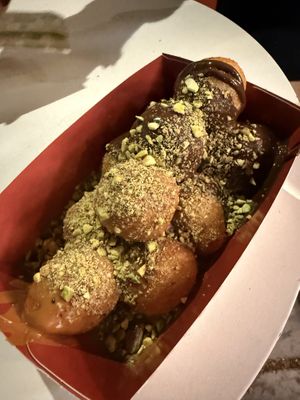 Half chocolate and half something else; pistachio on top    at Lukumades in Athens