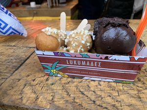 “Vegano”: filled with vegan chocolate praline, topped with almonds, peanut butter and vegan chocolate ice cream. at Lukumades in Athens