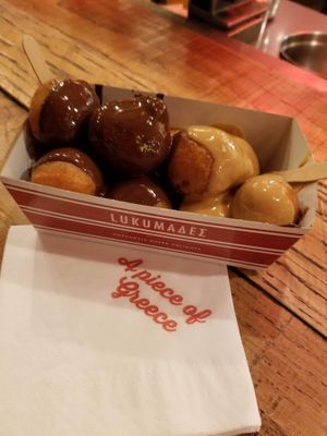 Chocolate and peanut butter sauce over praline filled at Lukumades in Athens