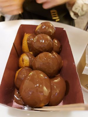 Drops of heaven covered in "bitter" chocolate at Lukumades in Athens