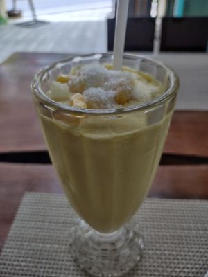 Pineapple mango turmeric smoothie at Wild Tribe Cafe in Koh Samui