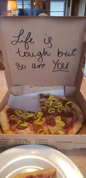 Love the little messages at Nags Head Pizza Company in Nags Head