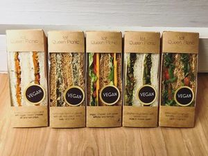 L-R: Smokey salmon-style carrot with vegan cream 'cheese', dill and red onion; Tuna-style jackfruit pieces with dill, red onion, sea kelp and nori; Vegan 'cheese' with pickle, lettuce and tomato; Chicken-style seitan with tomato and basil & rocket pesto; Beef-style seitan with tomato, rocket and dijon mustard at Queen Picnic - Food Stall in London