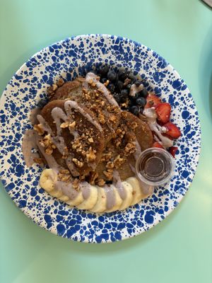 Oatmeal Pancakes and fruit. Super delicious and filling!   at The Daily Beet - Girod St in New Orleans