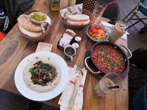 Hummus (unexpectedly delicious!) and shakshuka (tasty but has no tofu or other protein) at Pancake House TLV in Tel Aviv