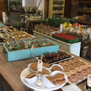 produce, fresh flowers, baked donuts , Apple cinnamon muffin tops, Easter chocolates  at Aziz Fruitstand  in Leamington