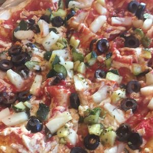 Pizza with high rise crust, vegan cheese and some veggies at Blaze Pizza in Frisco