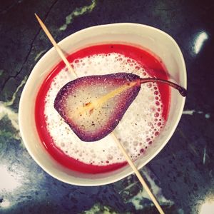 Beet-Root-Topinambour-Soup with Almond-Foam and a elderberrie poached Pear  at The Green in Nuremberg