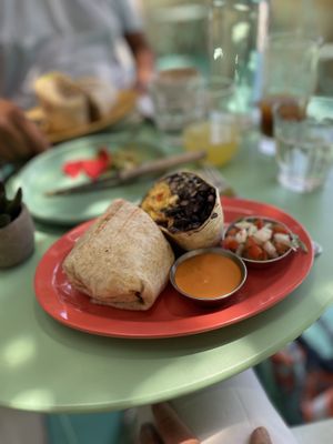 Brekki burrito with the spicy sauce on the side 🌶   at Jajaja Mexicana - Lower East Side in New York City