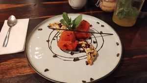 Hot and cold dessert with apple dumplings and strawberry ice-cream. at Wei&Wei in Aachen