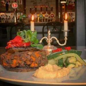 Vegan Burger. Black Bean & Butternut Squash Burger with Flat Cap Mushrooms, Chilli Courgettes & Hummus at No Three Old Bar & Restaurant in Collon