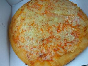 Deep fried pizza at Land and Sea Fish and Chip Shop in Polmont