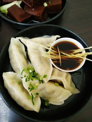 Steam dumpling $5.50 at Rice House 谷王栈( 粥大王) in Central Singapore