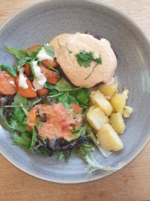 Kidney bean burger, salads, potatoes, delicious dressings $16.00 at Friends of the Earth Cafe in Collingwood