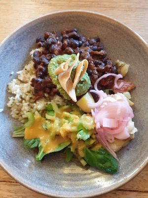 Blackbean+tomato hotpot, Kale pepito rice, Guacamole, Roast potato w/tofu mayo, Garden salad $16.50 at Friends of the Earth Cafe in Collingwood