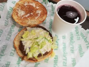 Mushroom burger with berry juice at Epoch Vegan Burger in Budapest