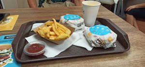 Burgers with fries and Orange Juice at Epoch Vegan Burger in Budapest