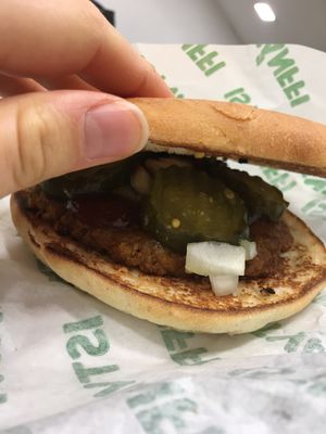 Inside of a simple burger at Epoch Vegan Burger in Budapest