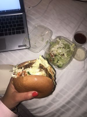 Burger with mushroom patty and salad  at Epoch Vegan Burger in Budapest