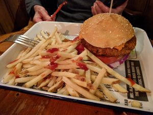 Spiced falafel burger topped with red pepper and chickpea hummus at The Peak Hotel in Castleton