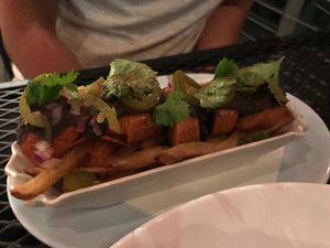 texican dog. replace for tofu dog. no creme. no cheese. on a bed of fries (since buns are non vegan) at Good Dog in Houston