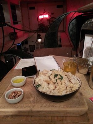 creamy cauliflower pasta, with olive oil and nuts at The Lab in Maastricht