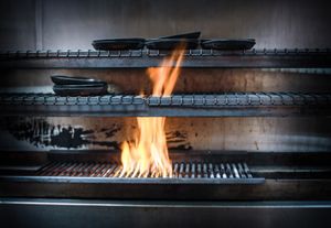 Woodfire grill at Flat Three  in West London