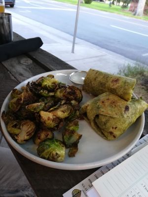Buffalo lions Maine wrap with fried brussel sprouts - not gluten free at The Gold Leaf in Fort Collins
