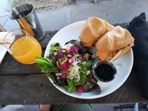 Gluten-free bánh mì with beet salad. at The Gold Leaf in Fort Collins