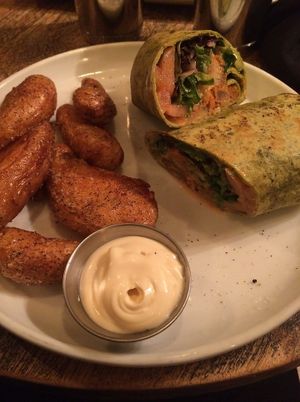 The Buffalo Lions Mane Wrap is SO SO amazing! The balance of flavors and textures are perfect -  crunchy fried mushrooms, crispy sauced greens, and oh so perfect onions! YUM! at The Gold Leaf in Fort Collins