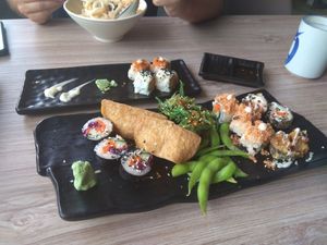 Mixed sushi plates and udon noodles at Sushi Kitchen in Penang