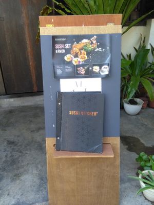 Menu stand at Sushi Kitchen in Penang