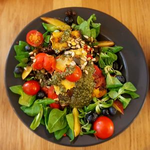 My husband's moussaka - he loved it. That's a fresh pesto on top.  at Wilk Syty in Wroclaw