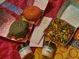 Cruelty free (black), daddy (pink), kapsalon fries. Didn't rate the blue sauce but the chicken pieces in the daddy burger were nice. #Veganuary at Vegan Junk Food Bar - 2D in Amsterdam