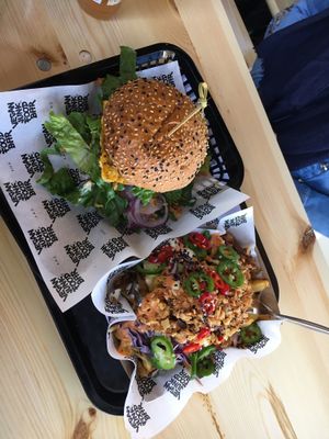 Amazing burger and loaded fries that didn’t last long! at Vegan Junk Food Bar - 2D in Amsterdam