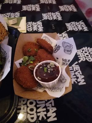 Chicken nuggets with bbq sauce at Vegan Junk Food Bar - 2D in Amsterdam