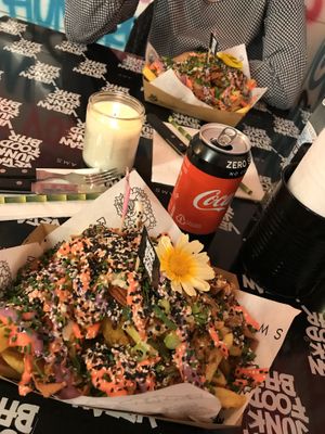 Iconic Rainbow Fries at Vegan Junk Food Bar - 2D in Amsterdam