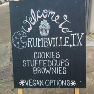 Sign stating vegan options  at Crumbville in Houston