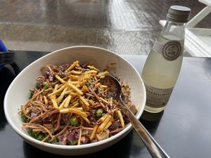 You make miso happy bowl with kale (tasty but too salty) and elderflower lemonade (allright) at Poké Perfect in Utrecht