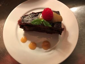 FUDGY CHOCOLATE TART Fudgy chocolate tart served with caramel sauce that is sugar free too nomnomnom at Faringo's in Blackpool