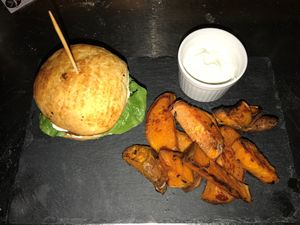 EDAMAME, MUSHROOM AND SESAME SEEDS BURGER

Edamame, mushroom and sesame seeds burger served with sweet potato wedges alongside house-made organic vegan garlic mayo at Faringo's in Blackpool