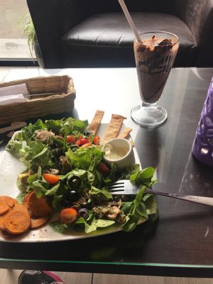 Special salad (made Vegan with chocho cheese) and almond ice cream milkshake at Dulce Albahaca Deli Restaurant in Quito