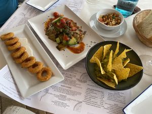 Guacamole and a nice dish with artichoke  at Antonio's Restaurant in Cartagena