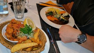 i had crispy chimmi churri vegan chicken with potatos and he had a vegan burger with non dairy chees and spinach ,delicious at Laegernstuebli in Boppelsen