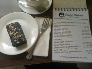 Warm vegan brownie and menu at French Bakery in Kathmandu