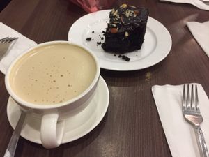 Vegan brownie and masala tea with soy milk  at French Bakery in Kathmandu