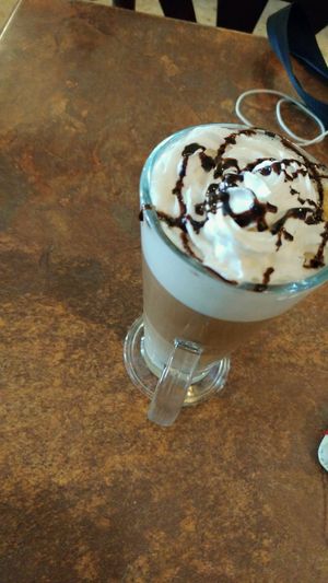 latte with vegan cream! at The Corra Linn in Salou