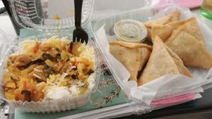 Steamed rice with some curried veg, spicy lentil & mixed veg samosa. at Fatima's in Worcester